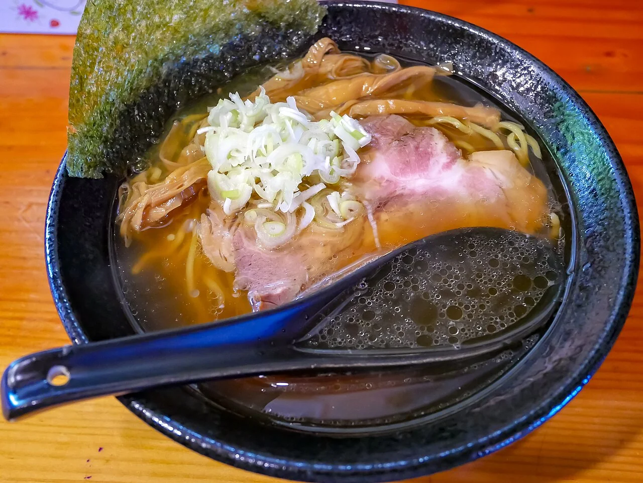 Chintan shoyu ramen at Takahashiya. An actual clear-soup shoyu ramen bowl identified as chintan shoyu ramen at Takahashiya by the source. The image illustrates clarity, not an ingredient guarantee.