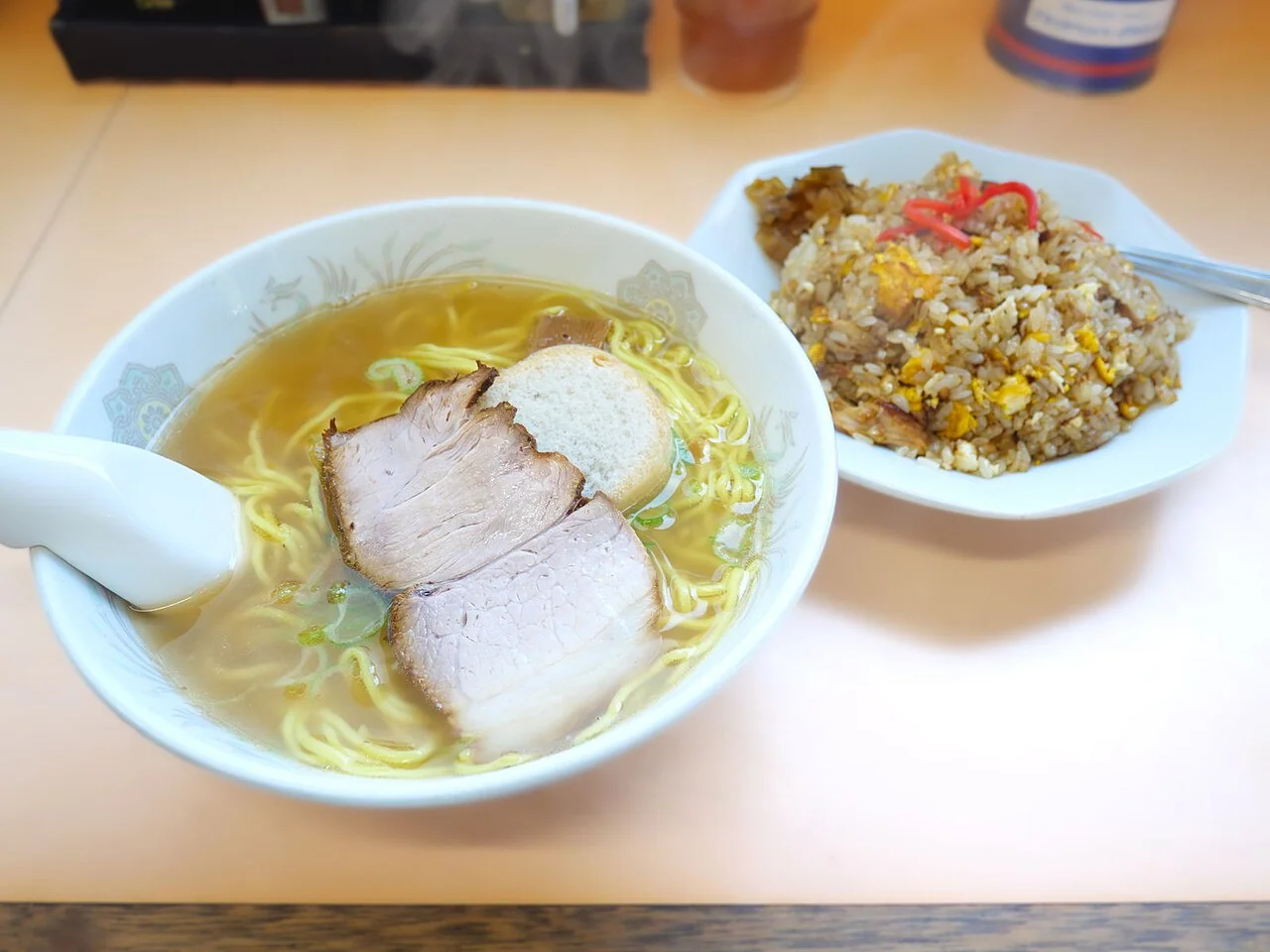Shio ramen at Manpuku Shokudo, Hakodate. An actual shio ramen bowl with a half-size fried-rice side at Manpuku Shokudo near Hakodate Dock-mae, photographed in June 2024.